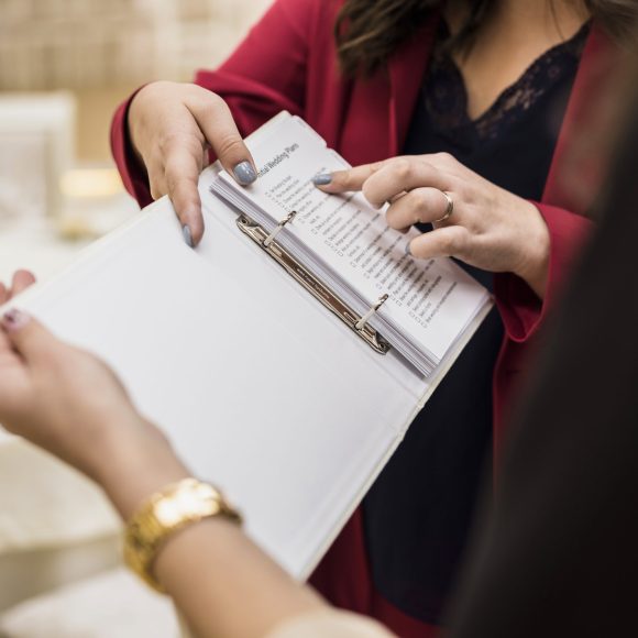 event-manager-showing-plan-paper